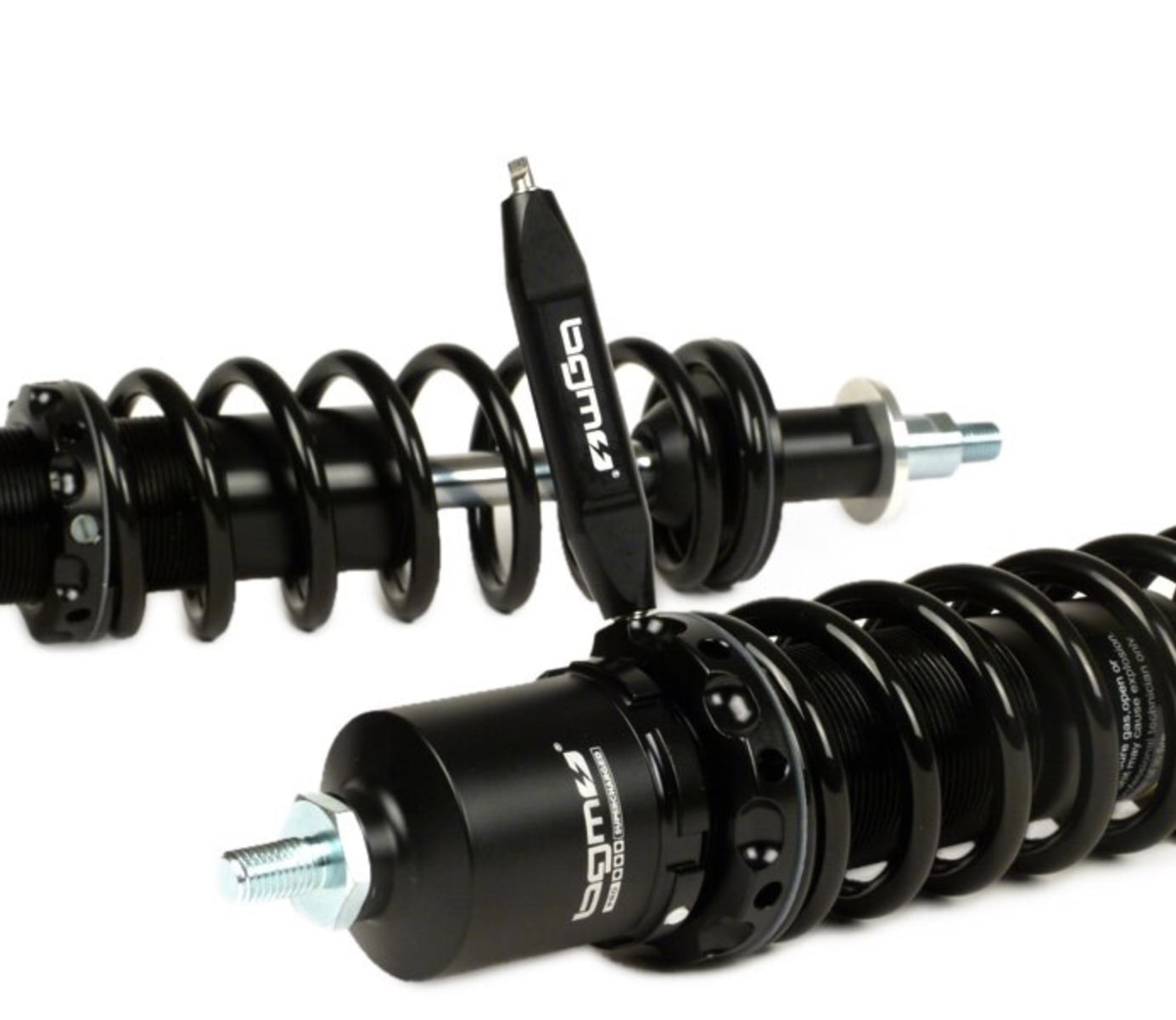 Iskunvaimennin setti BGM PRO SC FR1 SPORT (musta), Vespa PX ja T5 <p class="product--title">Sporttinen, taattua BGM Pro laatua oleva iskarisetti PX:ään. BGM PRO SC FR1 SPORT sopii malleihin Vespa PX80, PX125, PX150, PX200, T5 125cc. Jousi ja runko mustia.</p> Sport ja Competition -mallin myötä BGM Pron tuotevalikoimassa on kaksi korkealaatuista iskunvaimennin sarjaa. <span class="JLqJ4b ChMk0b" data-language-for-alternatives="fi" data-language-to-translate-into="auto" data-phrase-index="1">Molemmilla on yhteistä korkea laatu, huippumateriaalit sekä ABE-hyväksyntä. </span> <span class="JLqJ4b ChMk0b" data-language-for-alternatives="fi" data-language-to-translate-into="auto" data-phrase-index="1">Iskunvaimentimet ovat erittäin kevyitä, kestävyydestä tinkimättä. Eskarit on valmistettu lujasta alumiinista CNC jyrsimällä ja niissä on kestävä kova-anodisoitu pinnoite.<span class="JLqJ4b" data-language-for-alternatives="fi" data-language-to-translate-into="auto" data-phrase-index="3"> Etuiskaritt ovat 15 mm lyhyempiä kuin alkuperäiset iskunvaimentimet ja laskevat siten ajoneuvon keulaa. Tämä on parantaa ajovakautta, on hyväksi huippunopeuksillä ja parantaa myös ulkonäköä. Lisäksi kääntövarren kulmaa pienenee, mikä parantaa jousituksen vastavuutta. Tuloksena oleva suurempi caster kulma vakauttaa skootterin käsittelyä suuremmilla nopeuksilla.</span></span> Iskunvaimennin setti BGM PRO SC FR1 SPORT (musta), Vespa PX ja T5