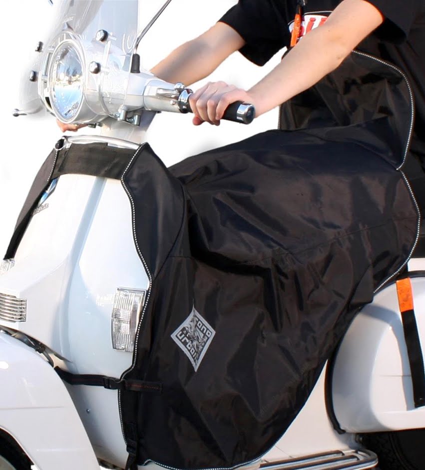 Tuuli/talvisuoja jaloille Termoscud Tucano Urbano, Vespa LX, LXV ja S Tuuli/talvisuoja jaloille Termoscud Tucano Urbano, Vespa LX, LXV ja S (50-150cc) malleille. <ul> <li>musta</li> </ul> Tuuli/talvisuoja jaloille Termoscud Tucano Urbano, Vespa LX, LXV ja S